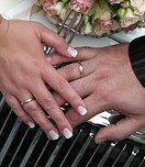 Couple's hands with ring